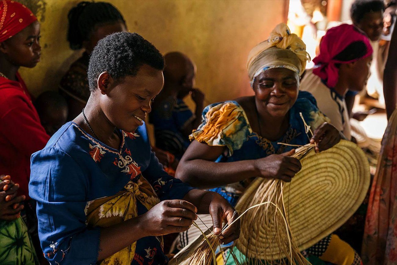Women hand-weaving the pieces we sell